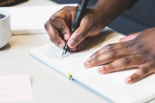 drawing-in-notebook_4460x4460